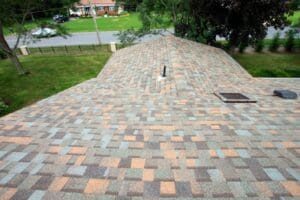 Multicolored asphalt roof with vent and skylight