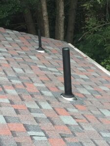 Close-up of roof vent and shingles