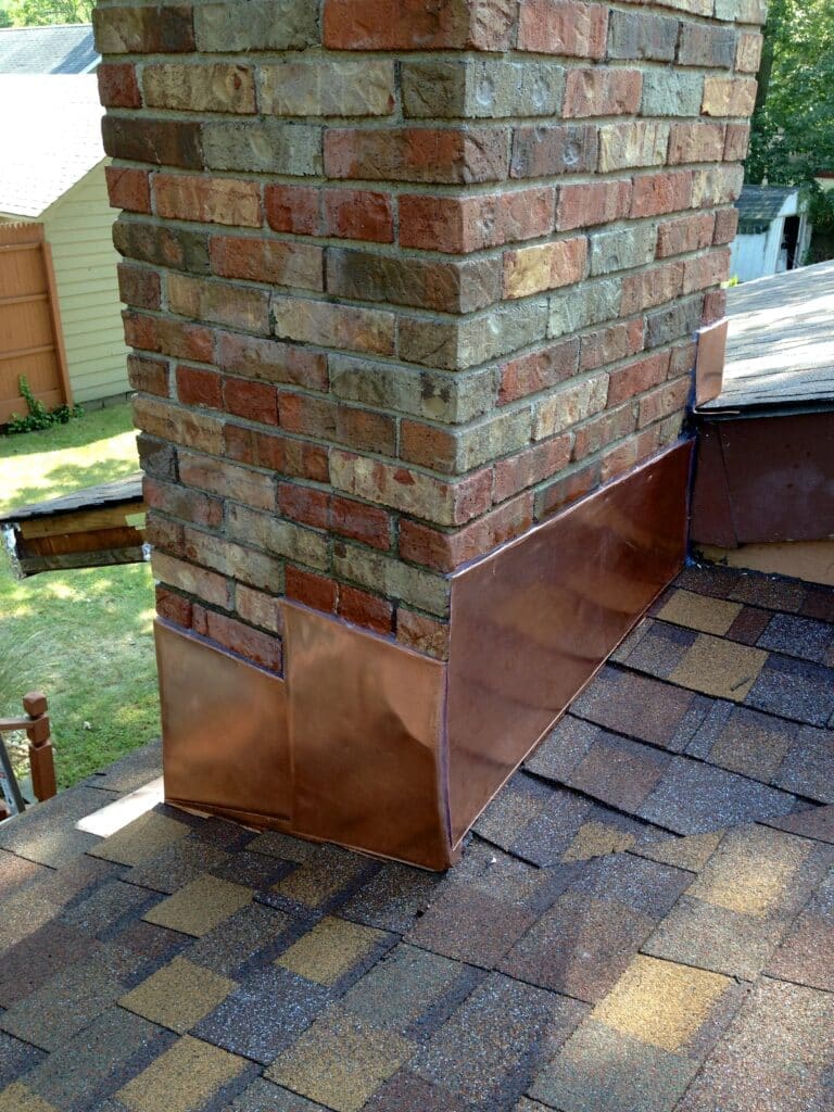 Chimney Flashing application with a Monroe NJ Roofing Company