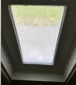 Fogged rectangular skylight with trapped moisture