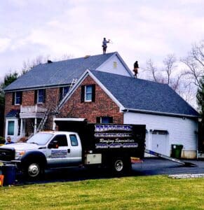 nj roofers on a roof working