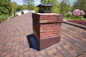 Rooftop chimney showing new flashing installation